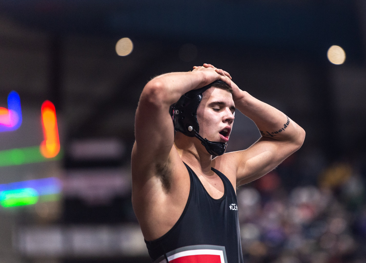 Tenino’s Kysen Knox, 170 pounds, catches his breath in between rounds at Mat Classic XXXIV on Friday, February 17, 2023, at the Tacoma Dome. (Joshua Hart/For The Chronicle)